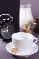 Cup of coffee at abstract paper background texture. Food and drink minimalism concept