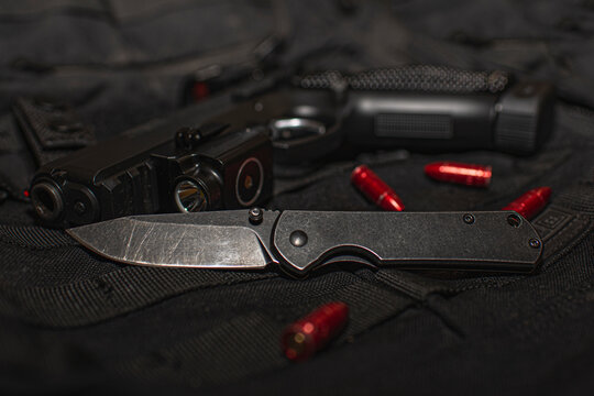 knife, gun and bullets