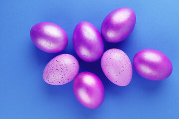 Red Easter eggs on a bright background. Easter background with eggs close up. Place for text.