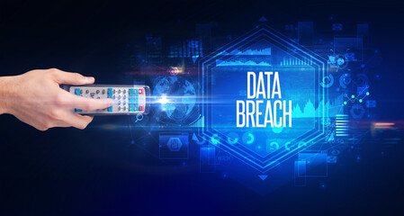 hand holding wireless peripheral, cyber security concept