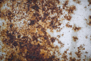 Rusty metal wall, old iron sheet covered with rust