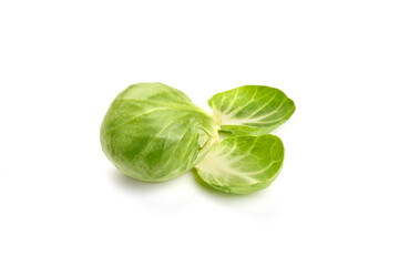 Fresh green Brussels sprouts, isolated on white background. High resolution image.
