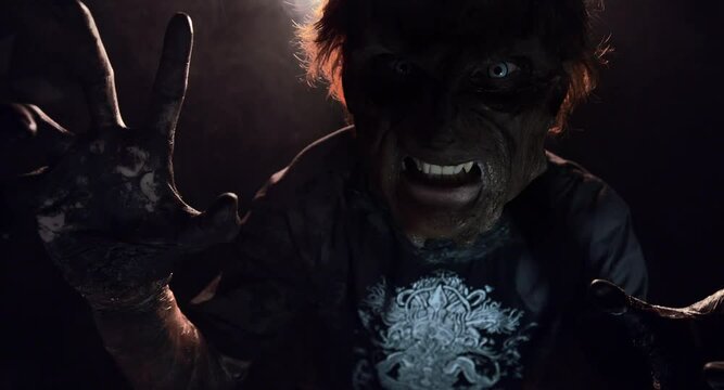 scary sorcerer in smoke. voodoo rite