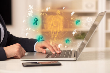 Doctor working on laptop with healthcare concept