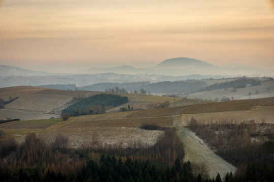 Beautiful misty sunset at Polish countryside