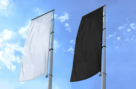 Two banner  flag white and black on blue sky background