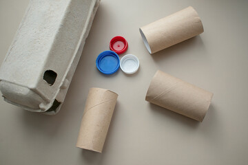 paper and plastic waste, garbage, on a neutral background, free space