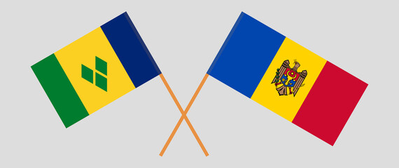 Crossed flags of Saint Vincent and the Grenadines and Moldova. Official colors. Correct proportion