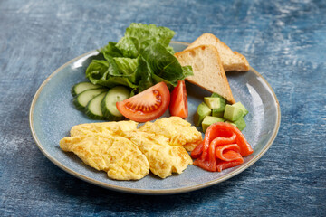 omelet with fresh vegetables and salmon
