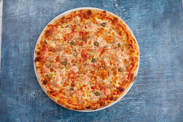 pizza on the wooden background