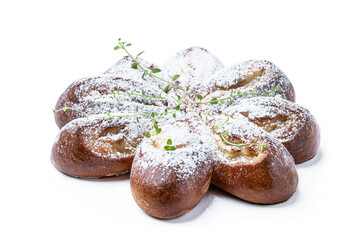 Freshly baked daisy bun isolated on a white