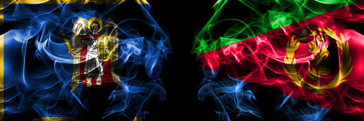 Kyiv, Kiev vs Eritrea, Eritrean flag. Smoke flags placed side by side isolated on black background.