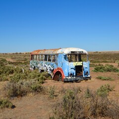 Abandoned bus in the desert Australian outback scrub