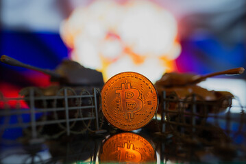 Barbed wire on the background of the Russian flag with bitcoin. The concept of sanctions and...