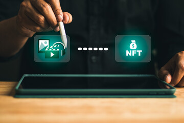 businessman using tablet for mint photo to be NFT art, digital future token. interface of artificial art, music and picture to become masterpiece, world wide.