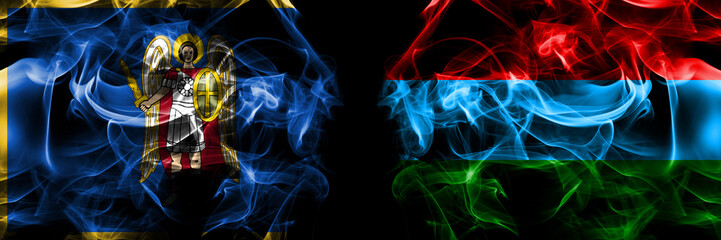 Kyiv, Kiev vs Russia, Russian, Karelia flag. Smoke flags placed side by side isolated on black background.
