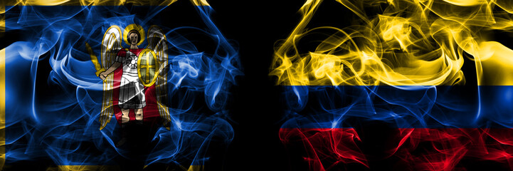 Kyiv, Kiev vs United States of America, America, US, USA, American, Colombia, Colombian flag. Smoke flags placed side by side isolated on black background.