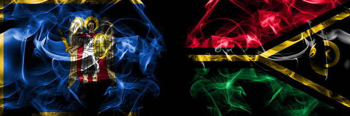 Kyiv, Kiev vs Vanuatu flag. Smoke flags placed side by side isolated on black background.