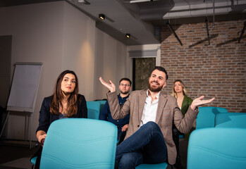 Shot of a group of businesspeople attending a conference