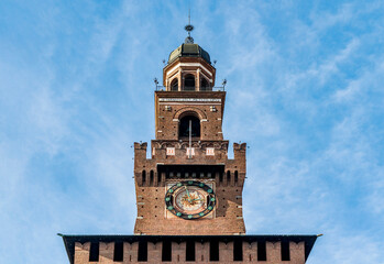 Fototapeta na wymiar The tower of the Filarete, at the entrance of the Castello Sforzesco, medieval fortification in Milan city center, Lombardy region, northern Italy. 