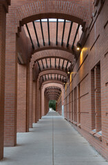 Corridor framed with numerous archways