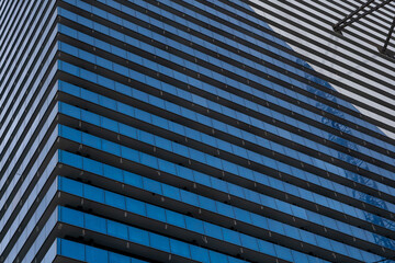 a close-up of a very large apartment building that creates an interesting pattern and ornament,