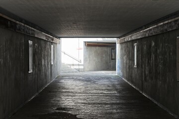 The light at the end of the tunnel with multiple possibilities. Left to the light and right continues in darkness.
