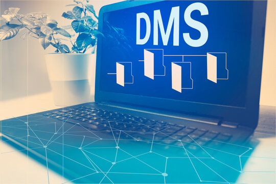 Document menagment system concept , laptop with letters DMS on it