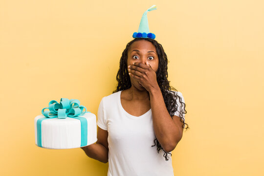 black pretty woman covering mouth with hands with a shocked