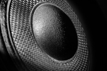 Dusty sound speaker woofer, close up