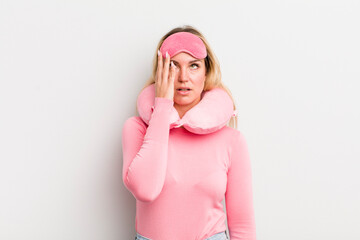 blonde pretty woman feeling bored, frustrated and sleepy after a tiresome