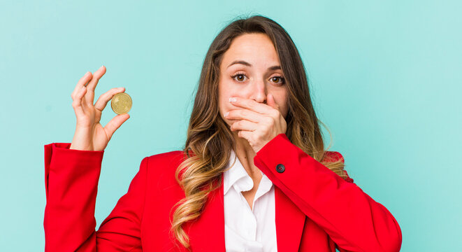 pretty woman covering mouth with hands with a shocked