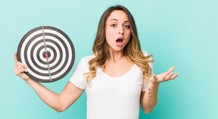 pretty woman amazed, shocked and astonished with an unbelievable surprise