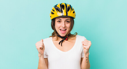 pretty woman feeling shocked,laughing and celebrating success