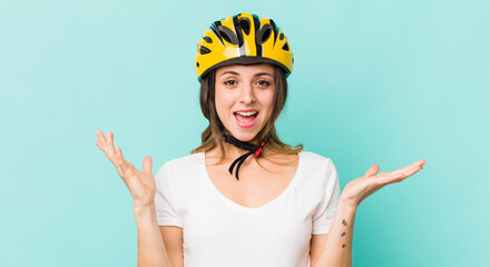 pretty woman feeling happy and astonished at something unbelievable