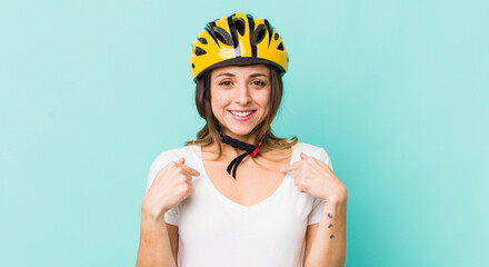 pretty woman feeling happy and pointing to self with an excited