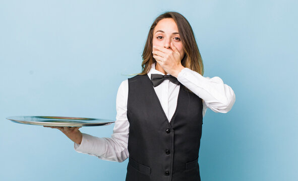 pretty woman covering mouth with hands with a shocked