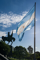 statue of Manuel Belgrano behind the light creator of the Argentine flag