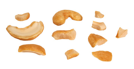 Cashew crushed into many pieces close-up isolated on white background