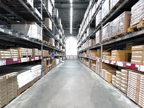 production warehouse storage with huge boxes packages on the shelves