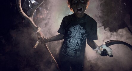 scary sorcerer in smoke. voodoo rite