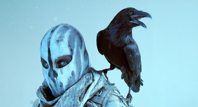 fighter with a crossbow and a raven
