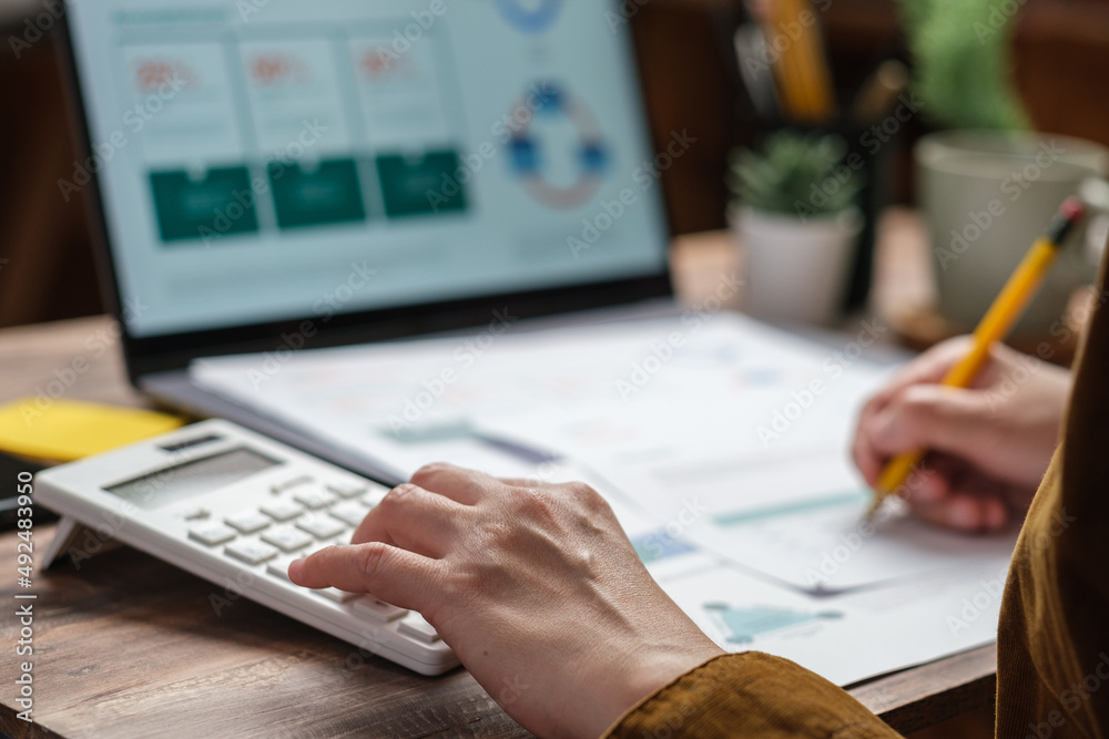 Poster close up hand using calculator calculate tax and budget of project at home