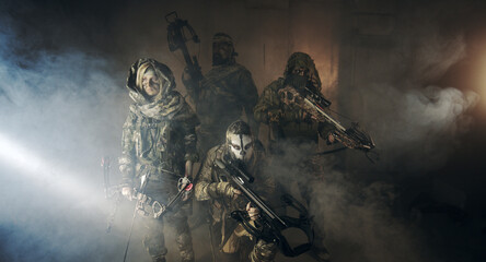 apocalypse fighters. a girl with a bow and a guy with crossbows.