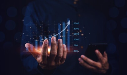 Businessman using smartphone or Tablet trading online in bitcoin forex stock market and other ETH...