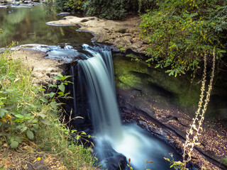 waterfall of dañicalqui estuary in the region of Ñuble, Chile, 
this waterfall is in a forest and...