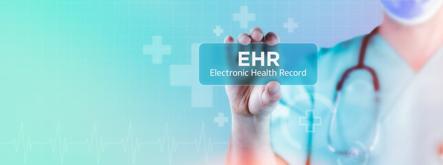 EHR (Electronic Health Record). Doctor holds virtual card in his hand. Medicine digital
