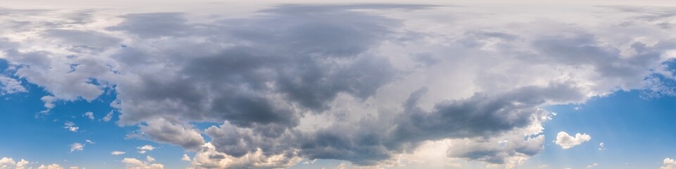 Blue sunset sky panorama with puffy Cumulus clouds. Seamless hdr pano in spherical equirectangular...