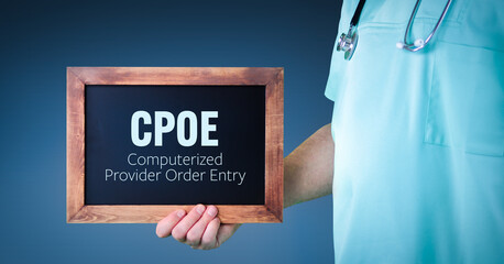 CPOE (Computerized Provider Order Entry). Doctor shows sign/board with wooden frame. Background blue