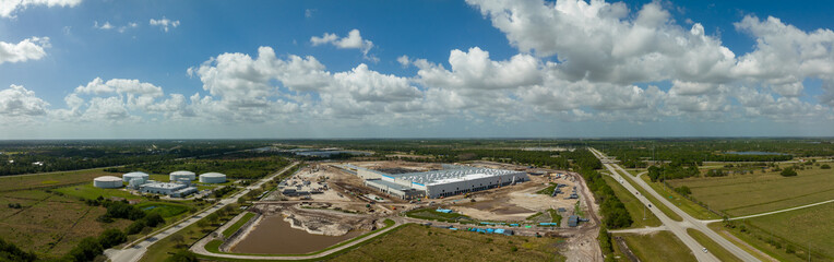 Fototapeta na wymiar Aerial panorama of a warehouse distribution center under construction